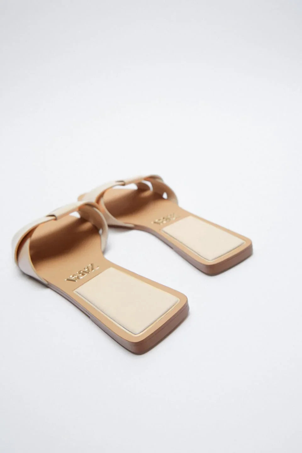 FLAT CRISS-CROSS LEATHER SLIDER SANDALS - BEIGE