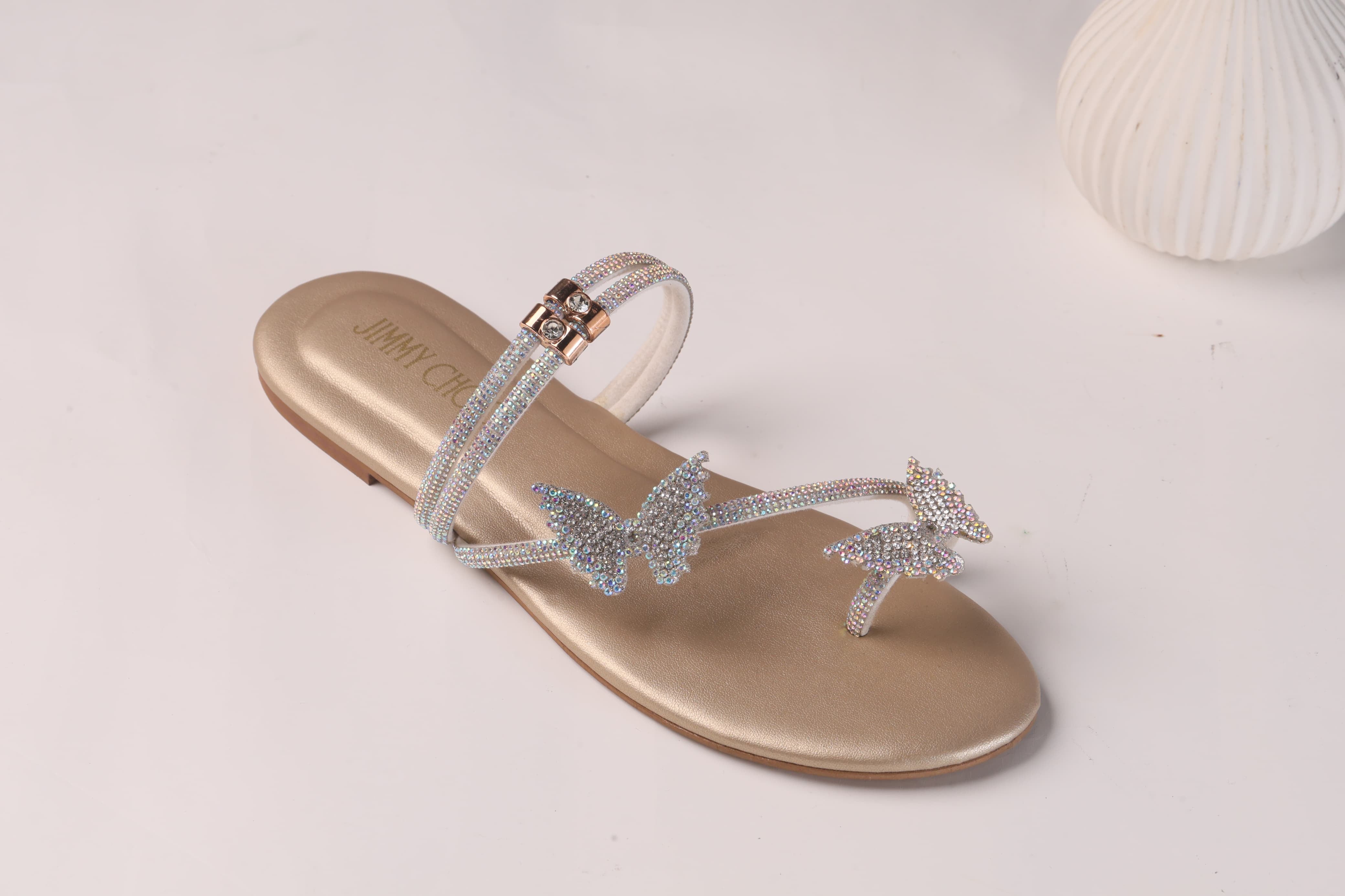 JIMMY CHOO MASH STRAP BUTTERFLY SLIPPERS - GOLD